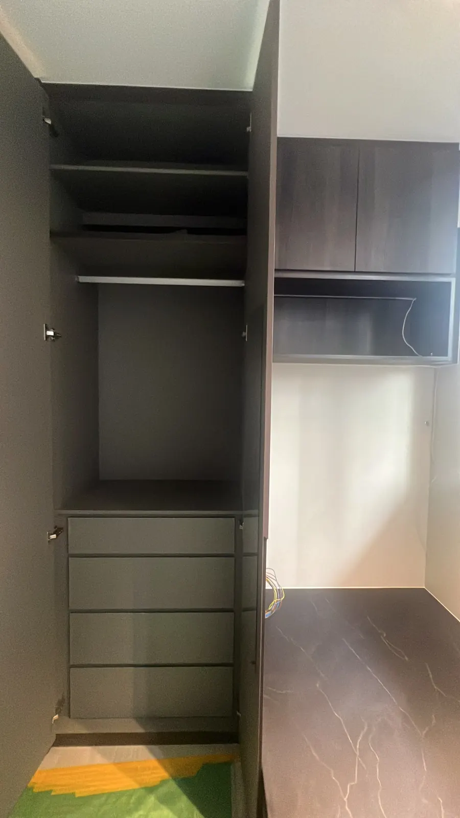 Open wardrobe beside the top-hung cabinet and open niche at Dairy Farm Residences